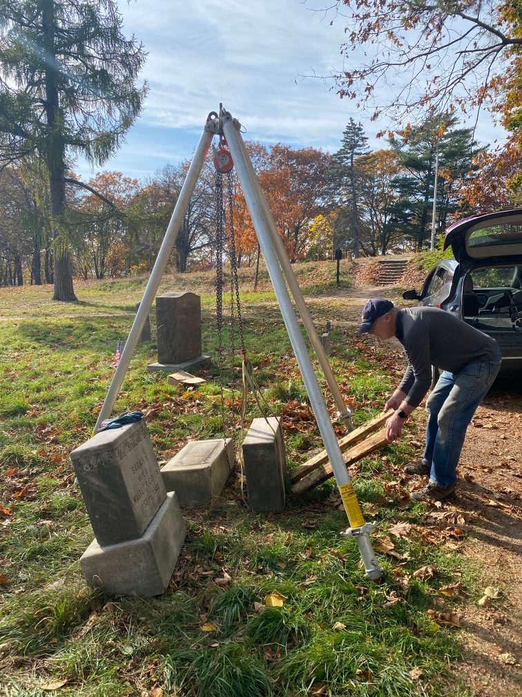 John Funk, Stewards&rsquo; president, readies to set a heavy tablet aside using a tripod